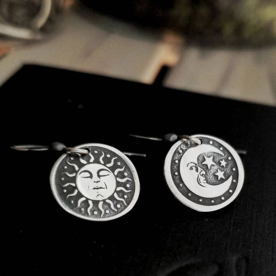 Sterling Silver Tribal Earrings one is a Sun the Other is the Moon